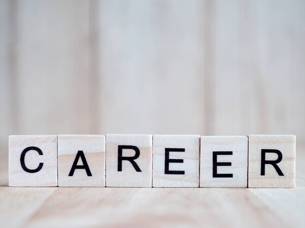 Word spell Career on wooden background 1