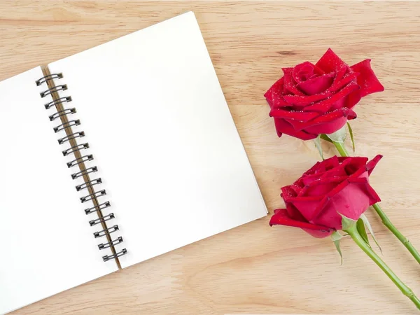 Two red rose flower and blank notebook 3 — Stock Photo, Image