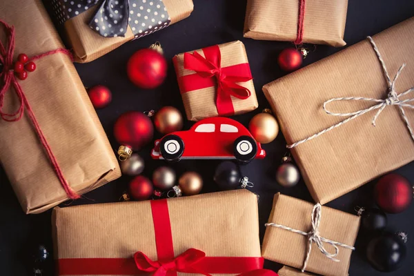Christmas gift and little toy car — Stock Photo, Image