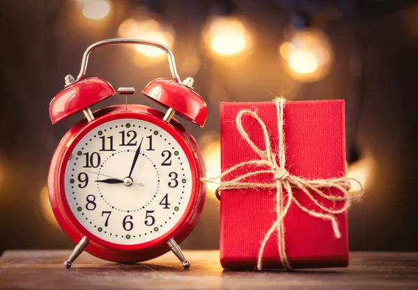 Handmade christmas gift and alarm clock Royalty Free Stock Images