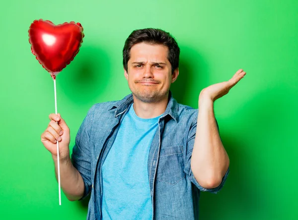 Pohledný muž s tvar srdce — Stock fotografie