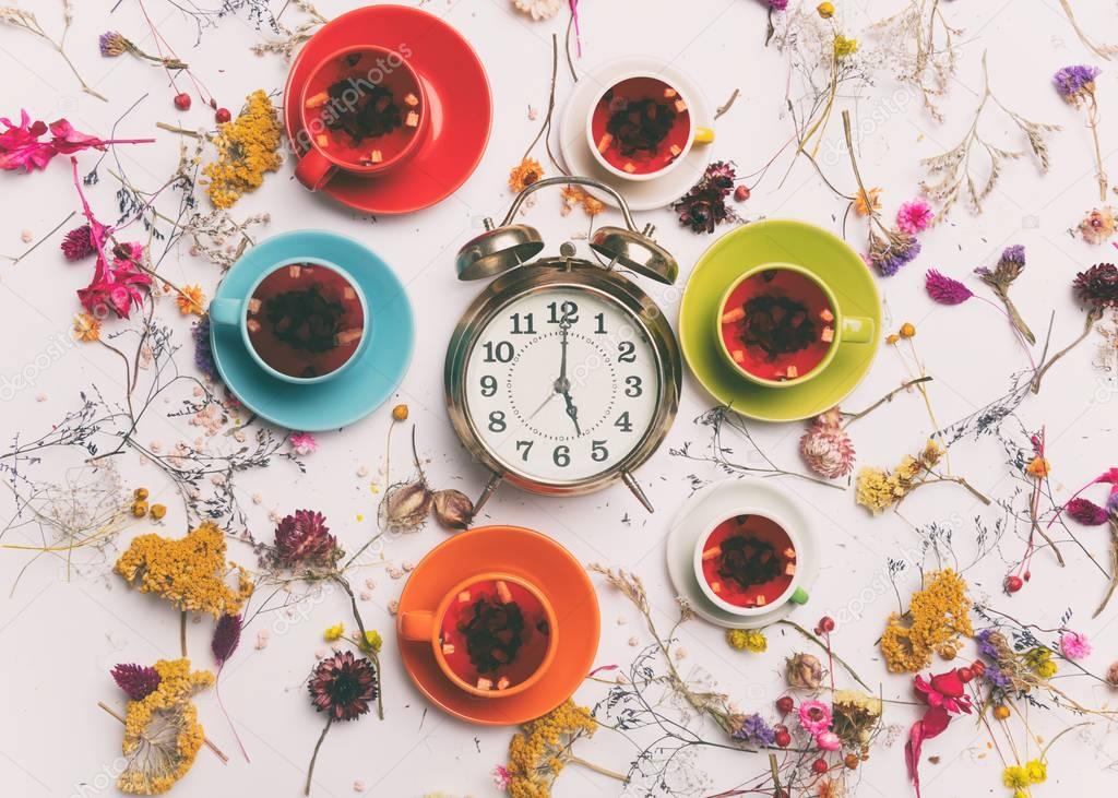 healthy organic tea and alarm clock