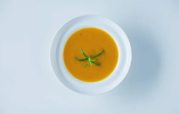 Pumpkin soup with rosemary — Stock Photo, Image