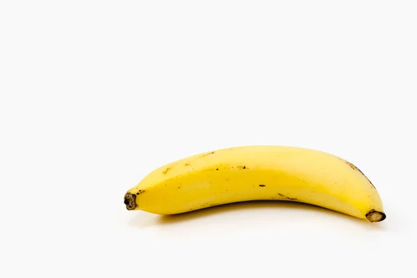 Ripe banana on white background - diet food concept with copy sp — Stock Photo, Image