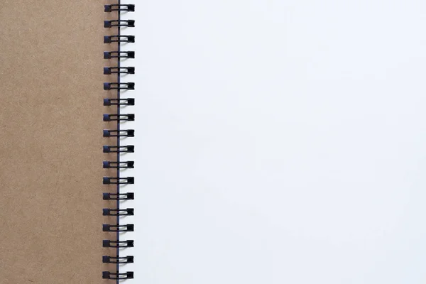 Close up shot of top view of closed spiral blank recycled paper — Stock Photo, Image