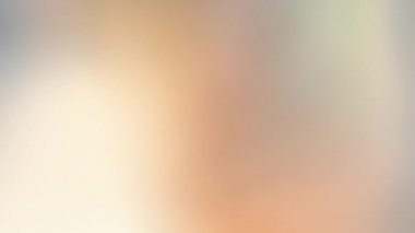 Güzel, soyut, bulanık, dikdörtgen döngü arka plan. Yavaş hareket eden açık sarı, turuncu ve yeşil renkler yumuşak renk geçişlerini değiştirir. Pürüzsüz arkaplan için 4k döngü.