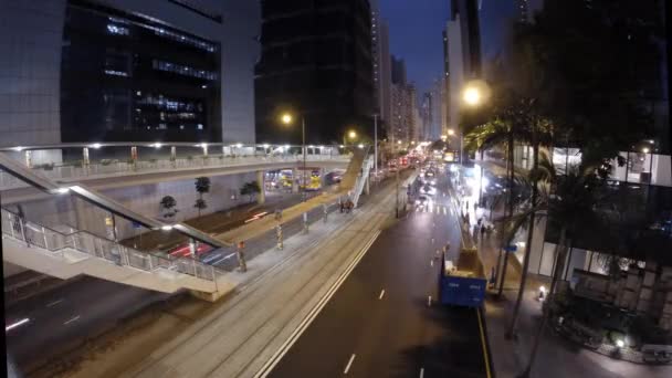 Timelapse av Hong Kongs livliga gatorna på natten — Stockvideo