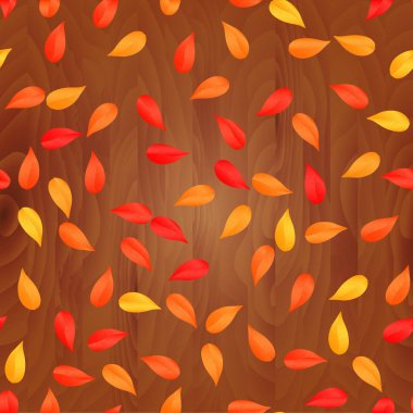 Ahşap tahta arka plan üzerinde sonbahar yaprakları