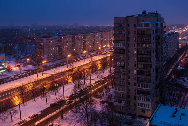 View from a height on Sofiyskaya street at twilight in apartment quarters, St. Petersburg, Russia