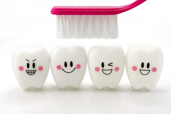 Brinquedos dentes em um humor sorridente — Fotografia de Stock