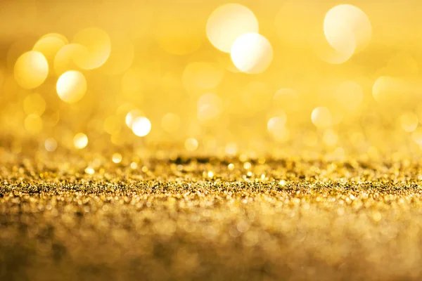 Oro lusso glitter de focalizzato sfondo astratto — Foto Stock