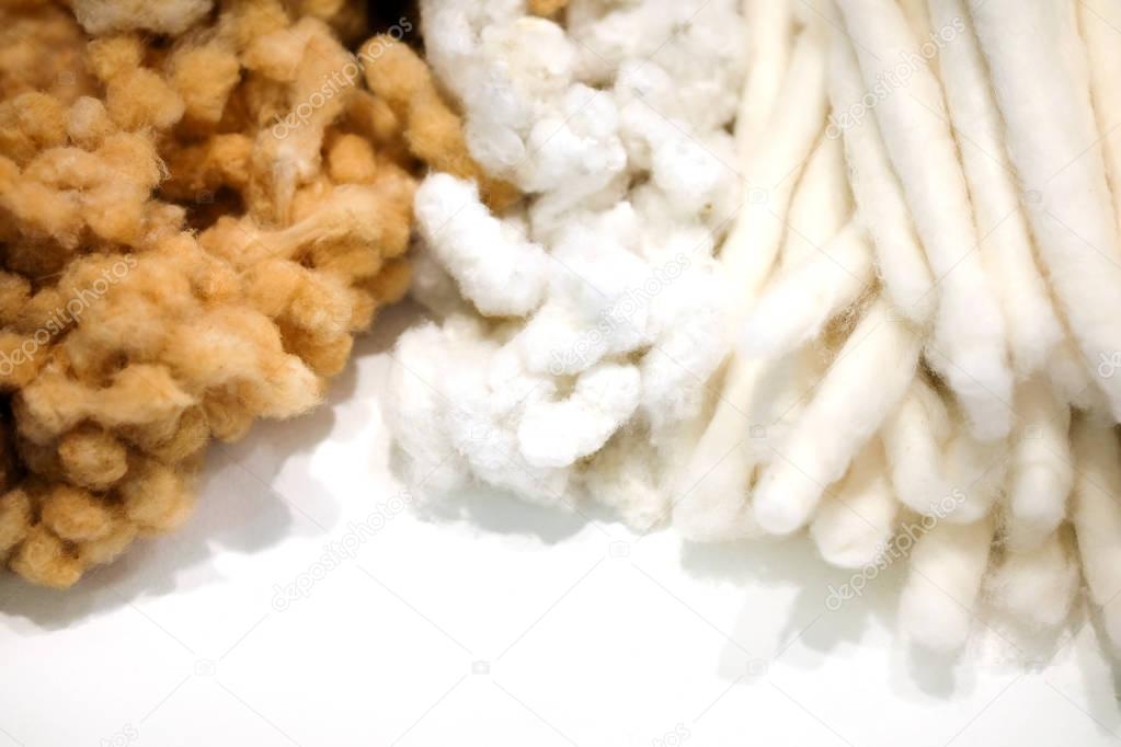 Raw cotton fiber Brown and white on a white background