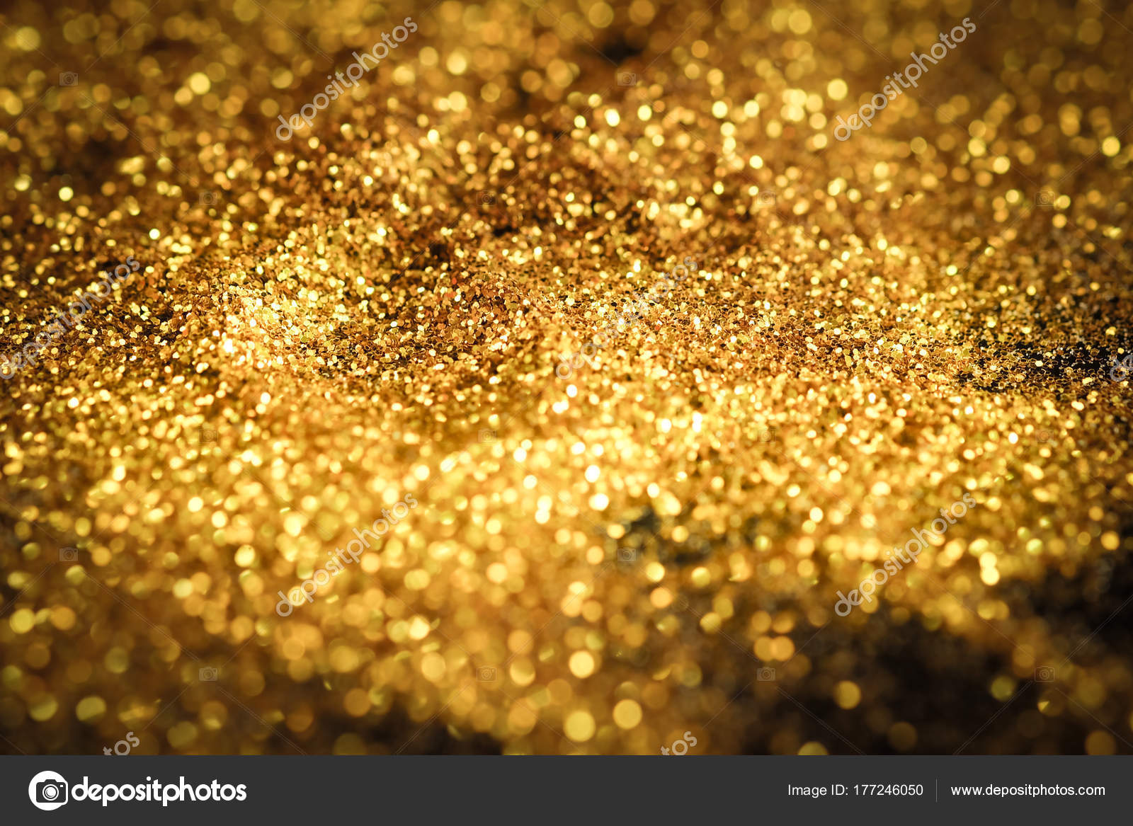 Download Sparkling gold on an elegant black background