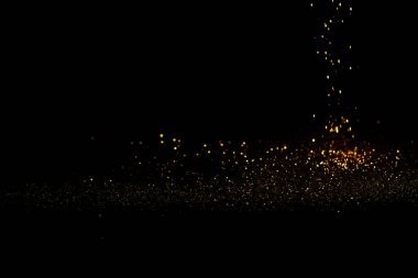 Kopya alanı ile karanlıkta Glitter altın tozu serpin