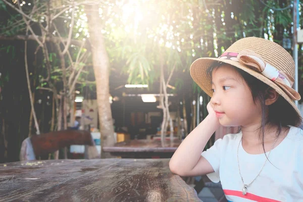 Asian Child Girl Wearing Hat Pose Hands Chin Table Copy — Stock Photo, Image