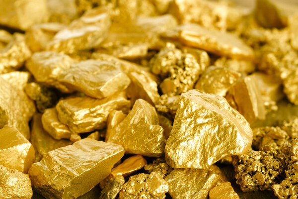 Close up lump of gold mine background texture