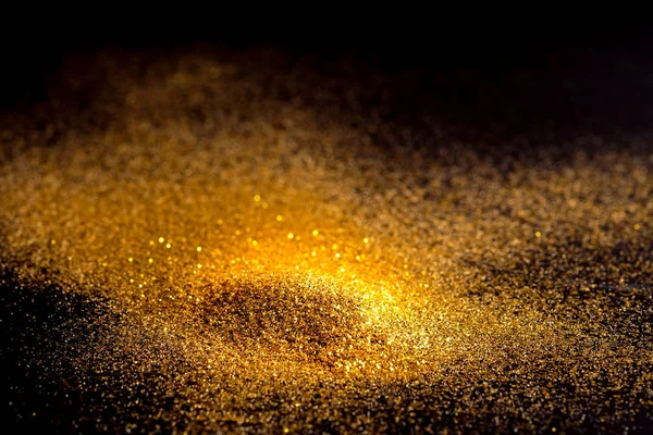 Cospargere Scintillio Polvere Oro Uno Sfondo Nero Con Spazio Copia — Foto Stock