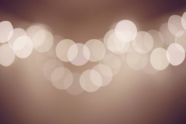 Mutlu Yıllar ve Mutlu Noeller klasik tonu için ışıkların soyut uydurma arka planı