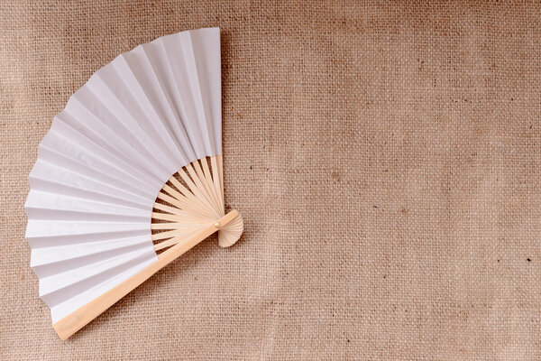 Fan on sackcloth