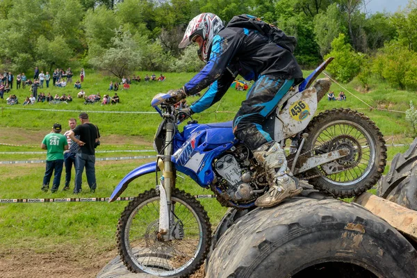 Enduro moto cross rider on a track — Stock Photo, Image