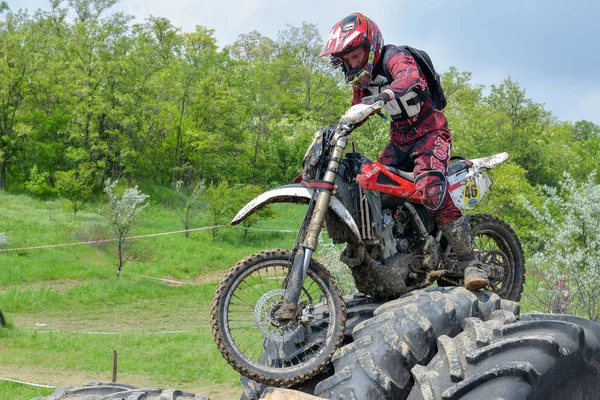 Enduro moto cross rider on a track — Stock Photo, Image