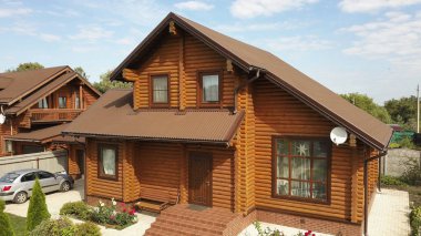 Beautiful wooden European house from a bar in the village.