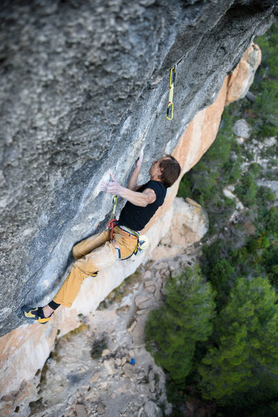 Extreme sport climbing. Rock climber struggle for success. Outdoor lifestyle. Adventure.
