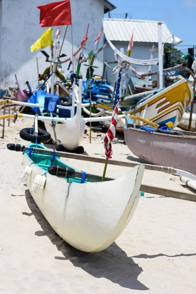 Exotic travel destinations.Traditional balinese boats, white sand beach. Discover Bali