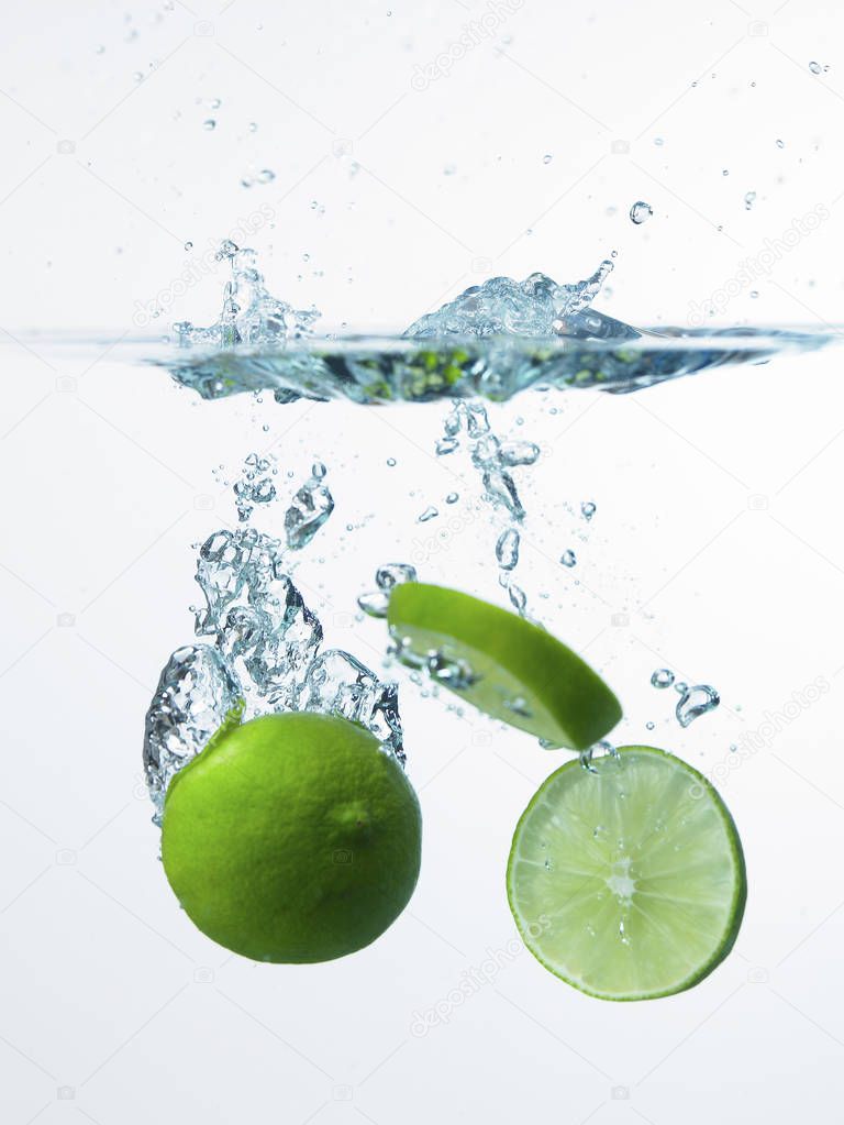 Fresh limes in water