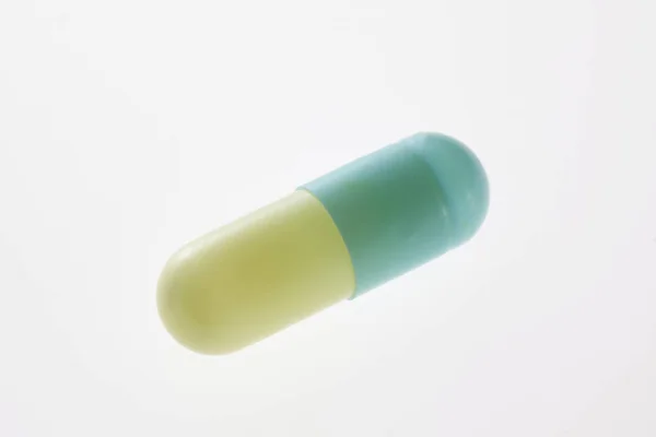 Medical capsule in laboratory — Stock Photo, Image