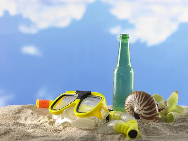 Summer objects lying on sand