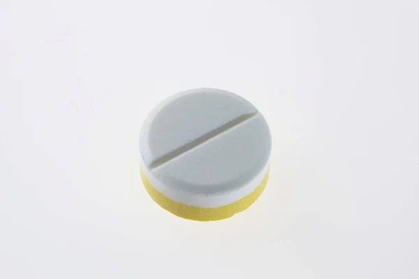 Medical pill on white background — Stock Photo, Image