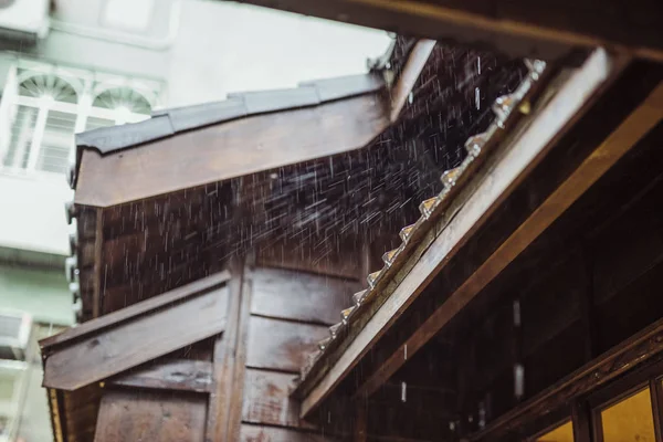 Rain on Roof of Leputing Restaurant