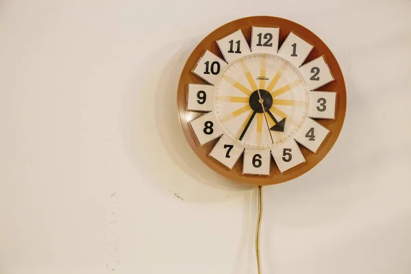 Wooden clock on wall — Stock Photo, Image