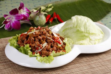 Tay domuz salata, yakından görmek 