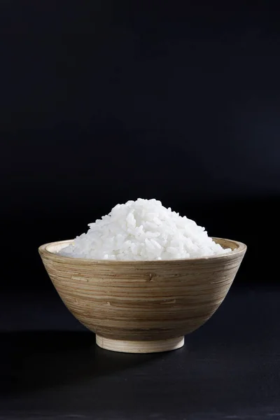 uncooked rice in bowl, close-up view