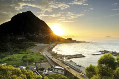 High angle shot of the highway beside the ocean in New Taipei City