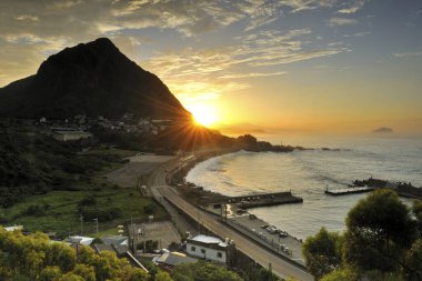 High angle shot of the highway beside the ocean in New Taipei City