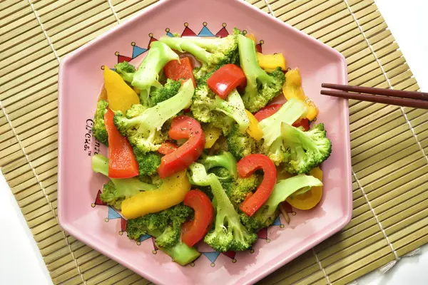 High angle shot of various vegetable on the pink plate — ストック写真