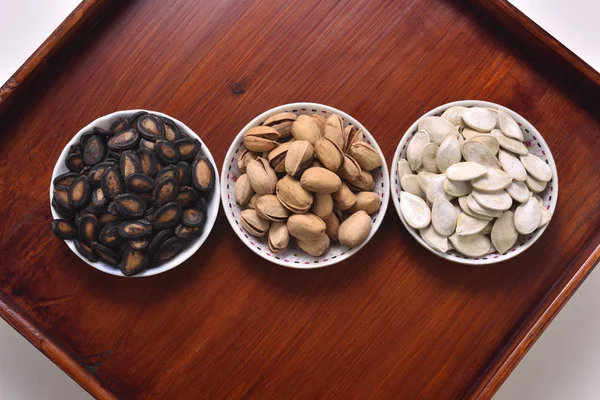 Uspořádání Čínský Nový rok ořechy a semena Čína — Stock fotografie