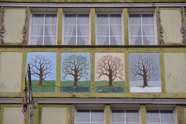 Close shot of windows with painting — ストック写真