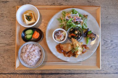 Directly above shot of the various food served on the white plate