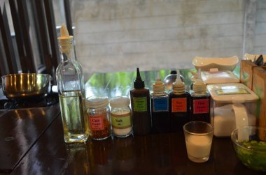 High angle shot of various spicy on the wooden table