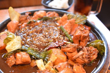 Dakgalbi- spicy stir fried chicken with rice cake in Seoul