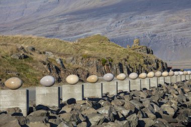 Iceland Djupivogur port with rocks clipart