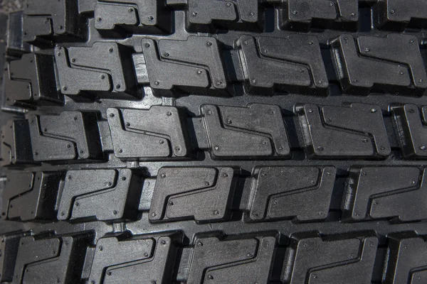 Siyah kauçuk lastik yakın çekim paterni basmak