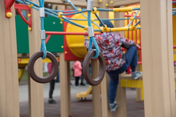 Playground in the street on rubber tiles