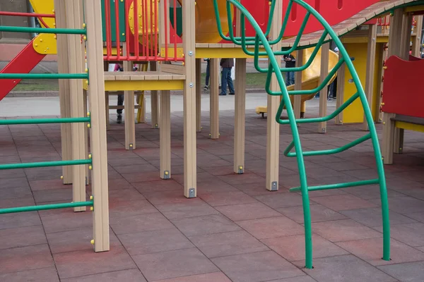 Playground in the street on rubber tiles