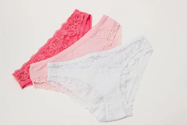 Women's panties with lace pink on a white background — Stock Photo, Image