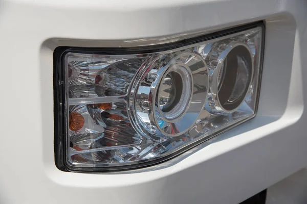 Signal headlamp protected by a grating from a heavy truck for in — Stock Photo, Image